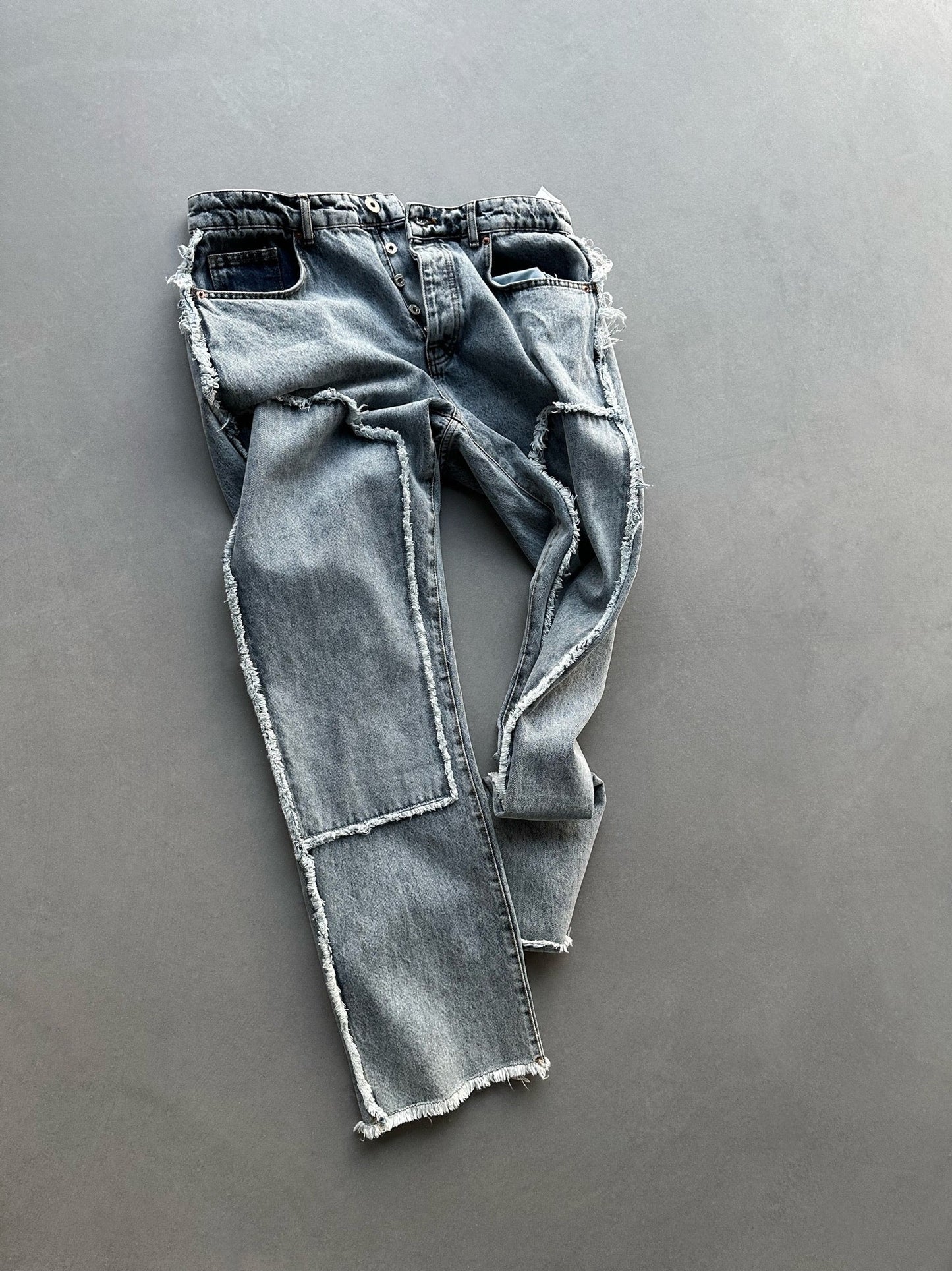 LIGHT BLUE LOOSE FIT TORN DETAIL JEAN