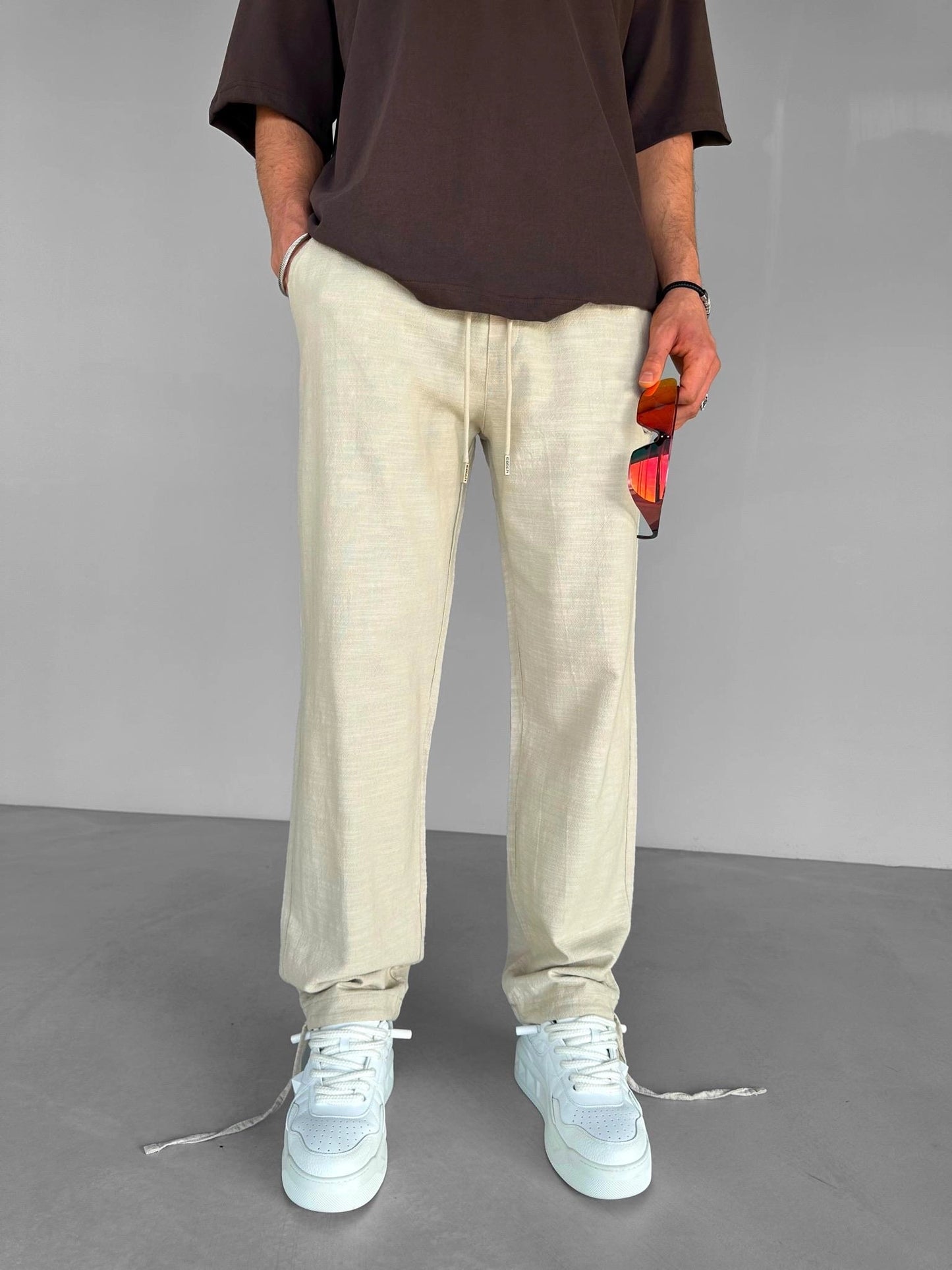 BEIGE ELASTIC WAIST LINEN TROUSERS