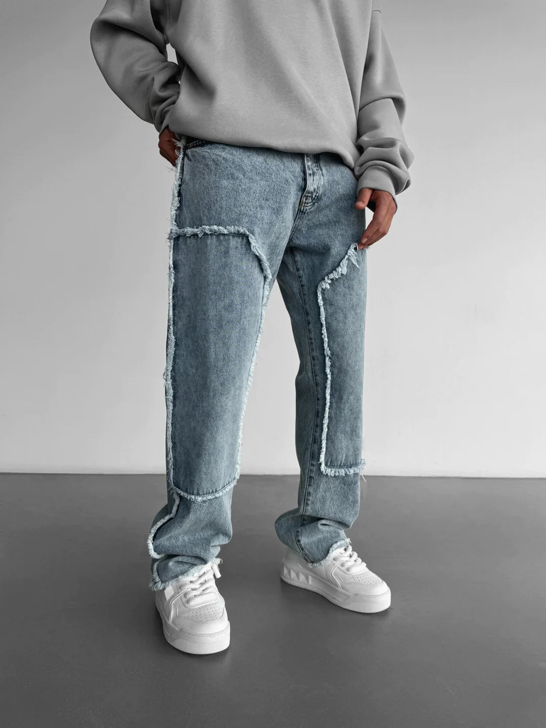 LIGHT BLUE LOOSE FIT TORN DETAIL JEAN