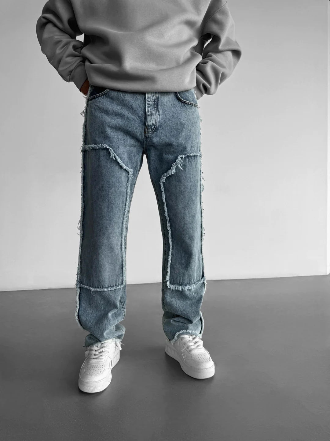 LIGHT BLUE LOOSE FIT TORN DETAIL JEAN