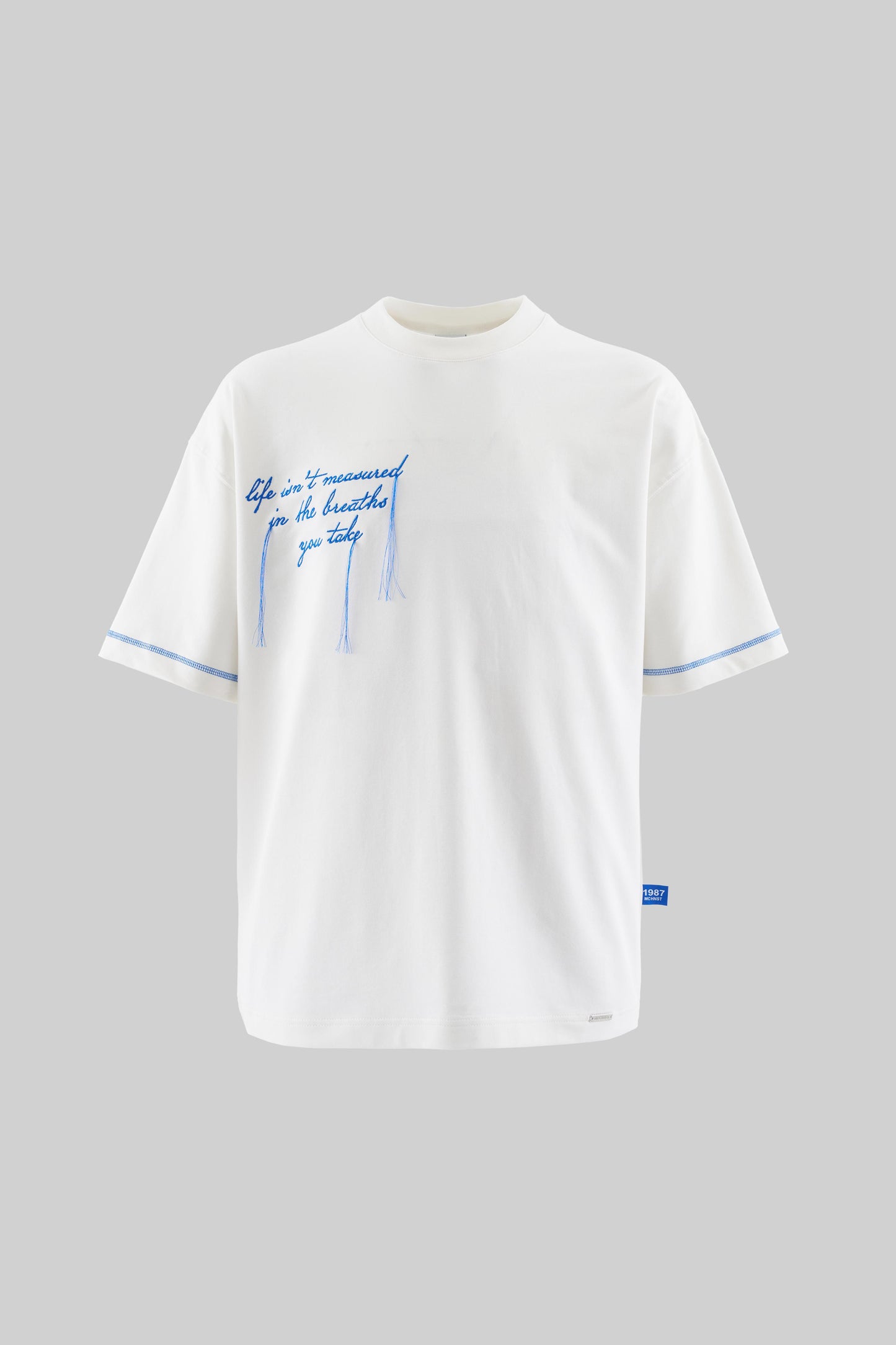 WHITE EMBROIDERED AND STRAIDE STITCH T-SHIRT