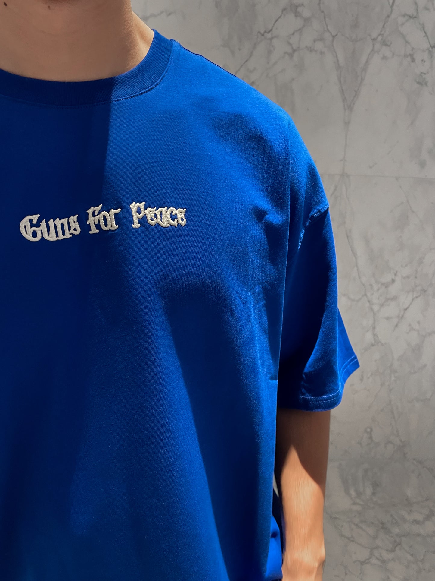 BLUE GUNS T-SHIRT