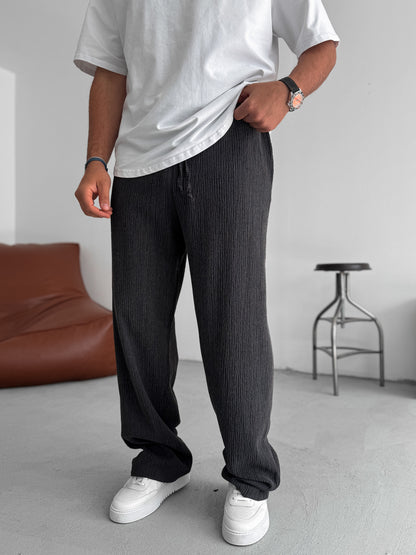 BLACK TEXTURED FLARED PANTS