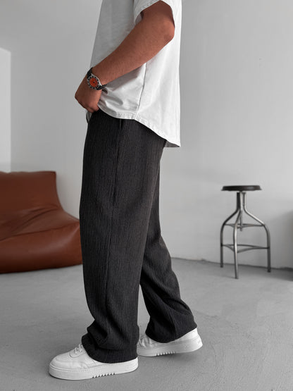 BLACK TEXTURED FLARED PANTS