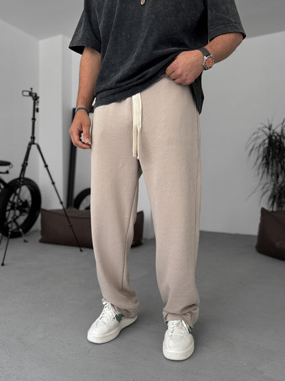 BEIGE THREE-THREAD CUT JOGGER